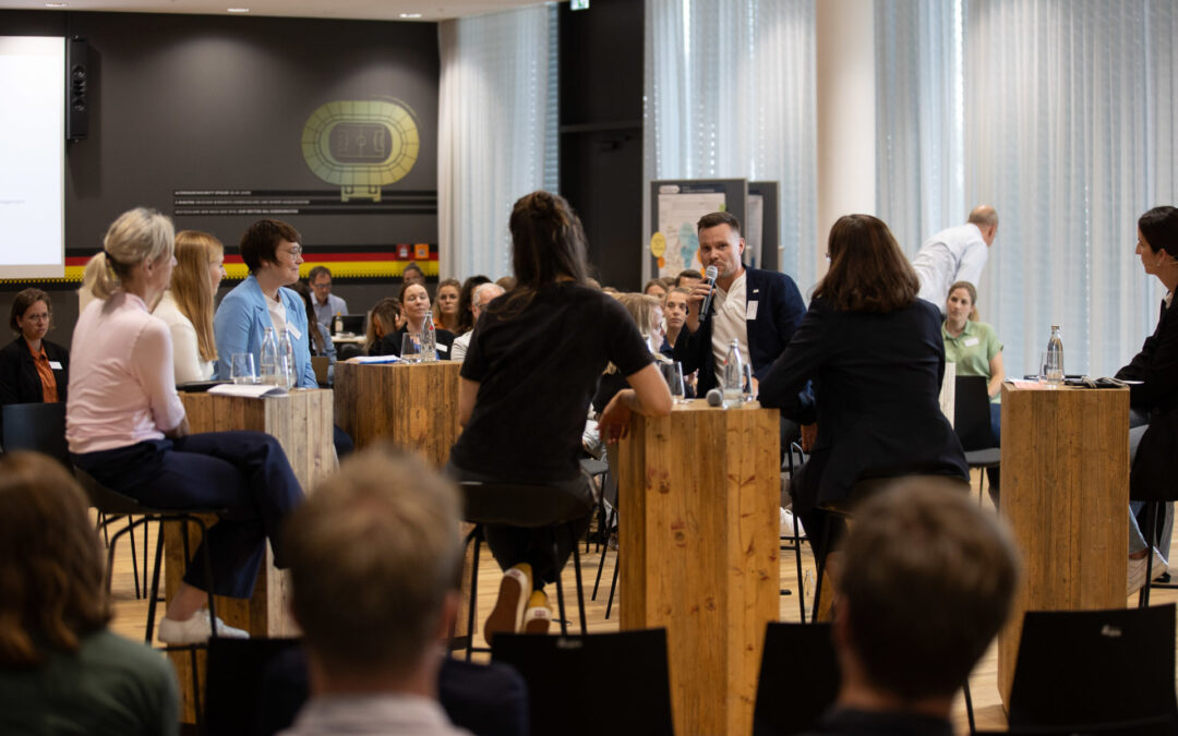 Auf dem Prüfstand: Symposium beleuchtet erste Ergebnisse aus Wissenschaft und Praxis